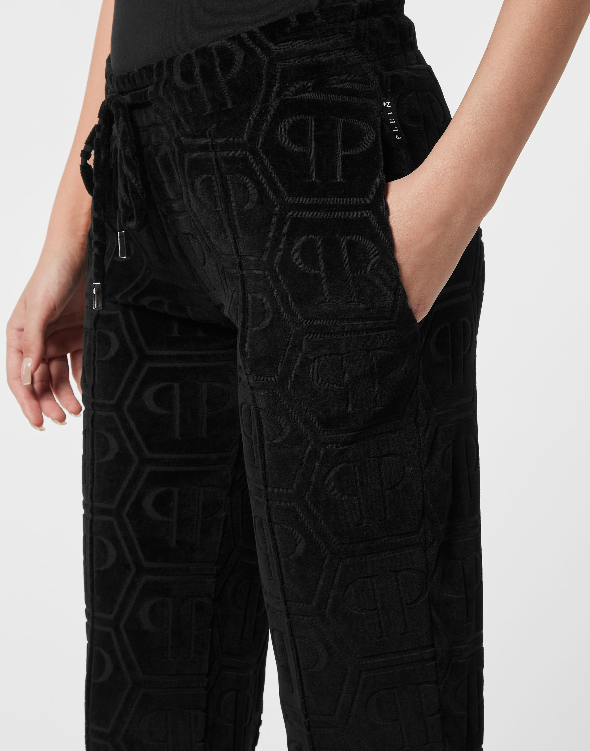 Fjädrade joggingsbyxor med jacquardmonogram