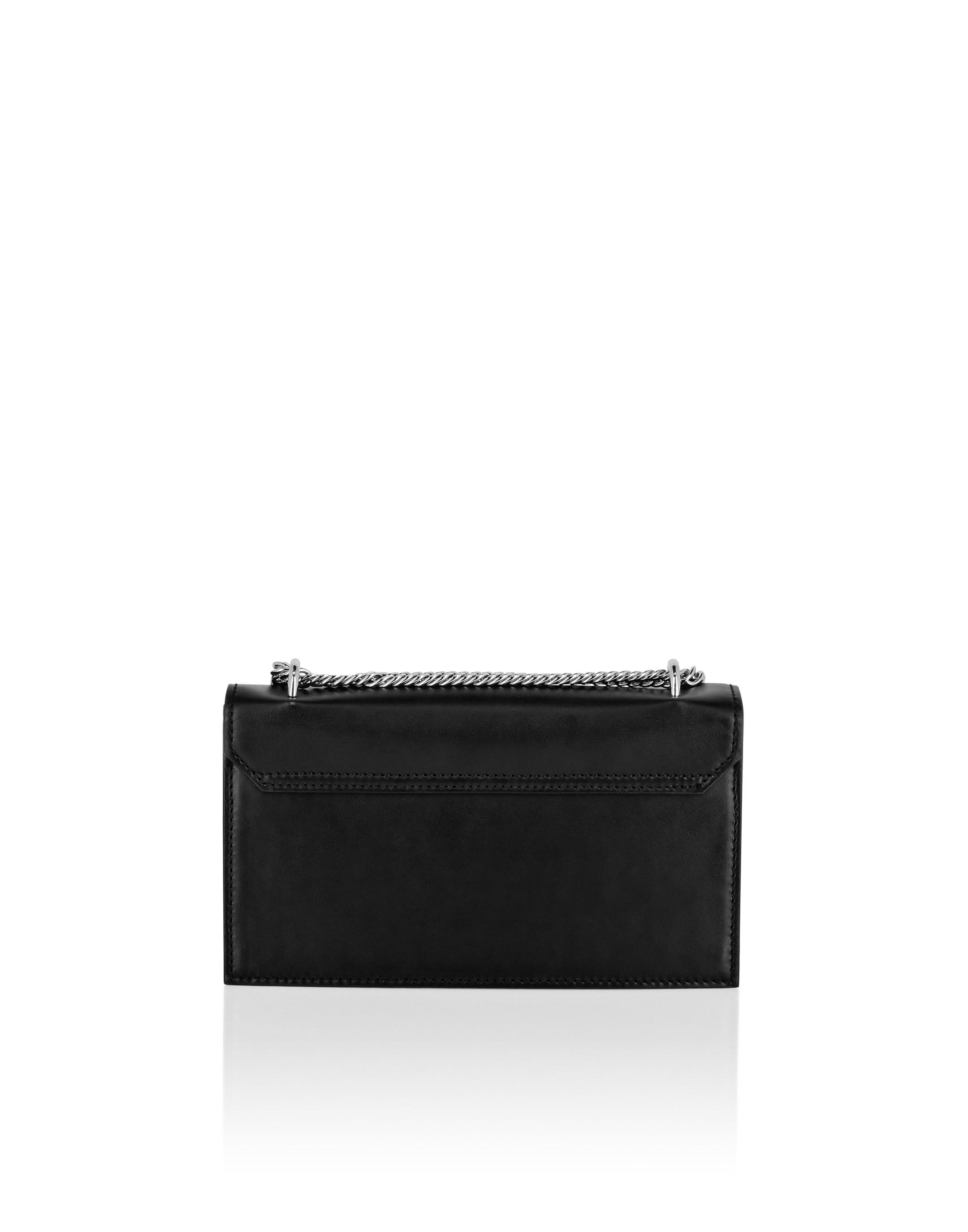 Liten läderaxelbag